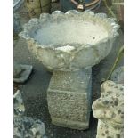 A concrete pedestal planter of petal form, set on a pedestal base - 25" overall