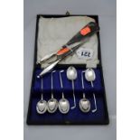 A SET OF SIX CASED SILVER TEASPOONS, with golf club handles, Birmingham 1932 with AWGC engraved to