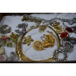 A TRATY OF COSTUME JEWELLERY, to include brooches, bracelets etc