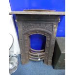 A PAIR OF IRON BEDROOM FIREPLACES