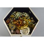 A SMALL BOX OF COSTUME JEWELLERY