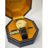 BULOVA - A GENTLEMANS AMBASSADOR CASED AUTOMATIC WRISTWATCH, the signed champagne dial with black