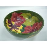 A MOORCROFT POTTERY BOWL, 'Hibiscus' pattern, impressed and painted marks to base, diameter