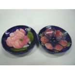 TWO MOORCROFT POTTERY PIN DISHES, 'Magnolia' and 'Clematis', impressed marks to base