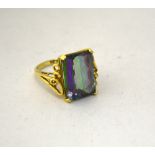 A DRESS RING, with fancy faceted rectangular shape mystic topaz, stamped 14K