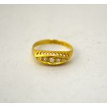 AN 18CT GOLD DIAMOND RING, the old cut graduated diamonds to the boat shape, hallmarks for