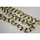 A NECKLACE AND BRACELET, comprising of small freshwater pearls interspaced by lapis lazuli, malacite