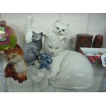 FOUR ORNAMENTAL CATS, to include white cat with painted 'Galle', 'R.C. 1977', Beswick cats etc (4)