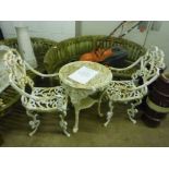 A PAIR OF HEAVY CAST IRON GARDEN ARMCHAIRS, with filigree scroll detail