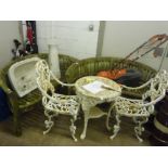 A PAIR OF TEAK GARDEN BENCHES, with an arched back and serpentine front seat