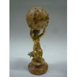 AN ORMOLU AND ALABASTER TIMEPIECE, depicting female sea creature holding a globe, on plinth,