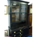 A KITCHEN DRESSER, with two glazed doors above a three drawer and single cupboard base and an oak