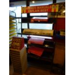 A 'HAYNES WORKSHOP MANUAL' shop display rack and two other smaller displays