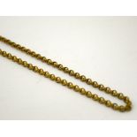 AN EARLY 20TH CENTURY GUARD CHAIN, length 80cm, weight 43gms
