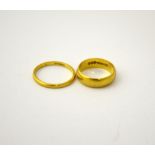 TWO 22CT GOLD BAND RINGS, hallmarks for London, ring sizes M 1/2 and S, approximate total weight 9.