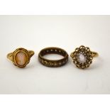 THREE RINGS, to include a cameo, a paste band ring and a cluster ring