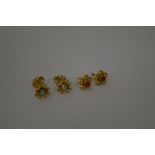 TWO PAIRS OF EARRINGS, both designed as flowers, approximate weight 3.3gms