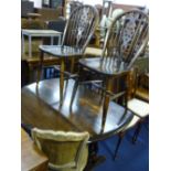 A DROP LEAF DINING TABLE, and four chairs (5)