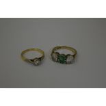 TWO RINGS, the first a single stone diamond ring, J 1/2, together with a green and white gemstone