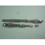 A SILVER TRAVELLING KNIFE AND FORK, Kings pattern, with engraved blade, Sheffield 1853, Martin