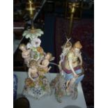 A DRESDEN CENTREPIECE CONVERTED TO A LAMP BASE, decorated with cherubs and foliage, together with