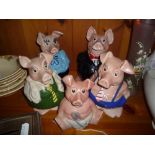 A SET OF FIVE WADE NATWEST PIGGY BANKS