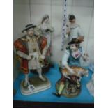 A CAPODIMONTE 'HENRY VIII' FIGURE, a pair of Punch and Judy figures, all by 'B Merli' and another