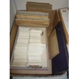 A QUANTITY OF CIGARETTE CARDS, loose, loosely inserted or stuck into albums, majority are pre WWII