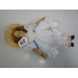 A CHAD VALLEY DOLL, velveteen head with painted features, felt arms and hands, cloth body and