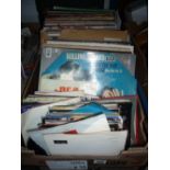 TWO BOXES OF LP'S AND SINGLES, artists include The Rolling Stones 'Through the Past, Darkly' etc