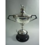 A SILVER LIDDED TWO HANDLED TROPHY, with standing dog finial, inscribed for Sutton Coldfield &