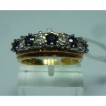AN 18CT GOLD DIAMOND AND SAPPHIRE BAND RING, with alternate diamonds and sapphires to the plain