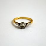 AN EARLY 20TH CENTURY DIAMOND RING, with old cut diamond to the bi metal coloured shank, estimated