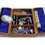 A SMALL BOX OF JEWELLERY, to include brooches, earrings, a shell cameo etc