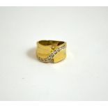 A CUBIC ZIRCONIA DRESS RING, stamped 585, ring size O 1/2