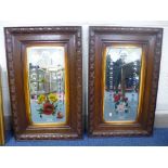 A PAIR OF VICTORIAN OAK FRAMED WALL MIRRORS WITH FLORAL DECORATION