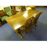 AN OLD CHARM DINING TABLE, and four wheelback chairs (5)