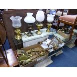 A QUANTITY OF MISCELLANEOUS, including oil lamps, electric lamps, brass fire irons, etc (7)