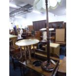 A MAHOGANY STANDARD LAMP WITH SHADE, and a circular brass tray top folding table (2)