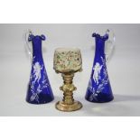 A PAIR OF MARY GREGORY STYLE BLUE GLASS JUGS, height approximately 19cm, together with glass