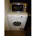 A HOTPOINT WASHING MACHINE, and a Logic microwave (2)