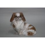 A ROYAL COPENHAGEN PEKINESE SEATED DOG, No 1772