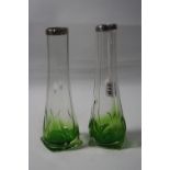 A PAIR OF GLASS SILVER TOPPED VASES, height approximately 21cm (a/f) (2)