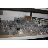 A QUANTITY OF CUT GLASS, glasses, dressing table sets, paperweights etc