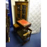 AN OAK GLAZED CORNER CUPBOARD, telephone table and a drop leaf occasional table (3)