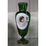 A 19TH CENTURY BOHEMIAN GREEN GLASS AND GILT DECORATED VASE, mounted with an opaque overlay portrait