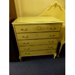 A CREAM AND GILT CHEST OF FIVE LONG DRAWERS