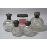 FIVE CUT GLASS SILVER TOPPED SCENT BOTTLES