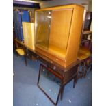 A TEAK GLAZED BOOKCASE, and a Stag dressing table with mirrors (2)