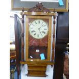 A 19TH CENTURY WALNUT INLAID WALL CLOCK (glass broken) (key and pendulum)